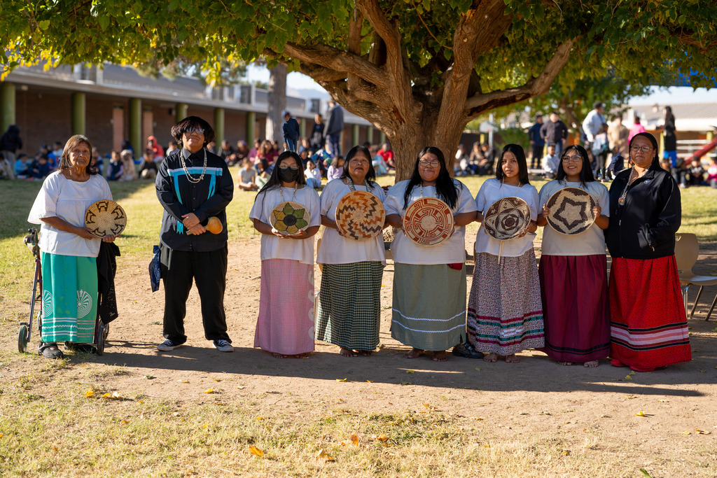 Native American Basket Dancers posed for a photo