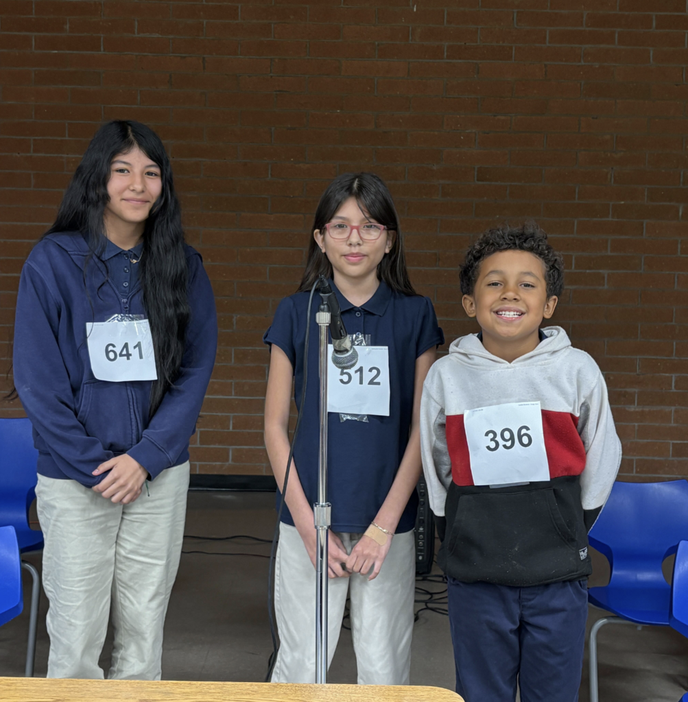 Spelling Bee Top 3: Left to right. Third Place: Erica in Ms. Marquez. Second Place: Mariela in Mrs. C and First Place Third Grader Josiah in Mrs. Williams