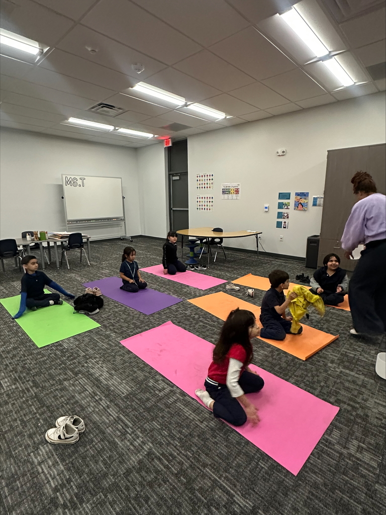 Students learning Yoga