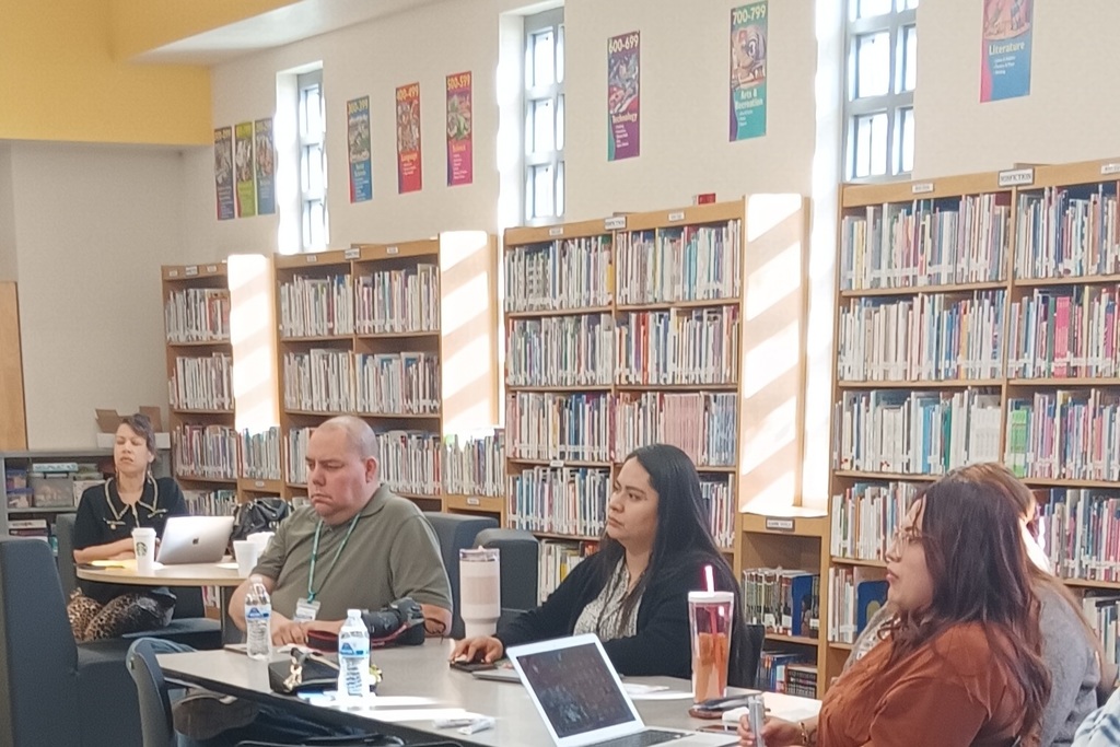 Image of parents and staff