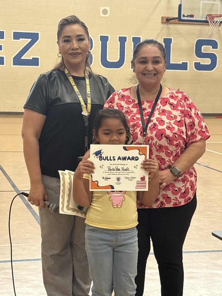 Ms. Vizcarra and her Bulls Award Winner
