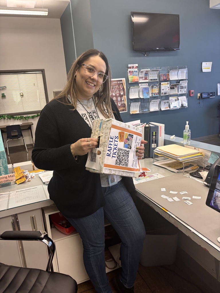 Staff member, raffle ticket box 