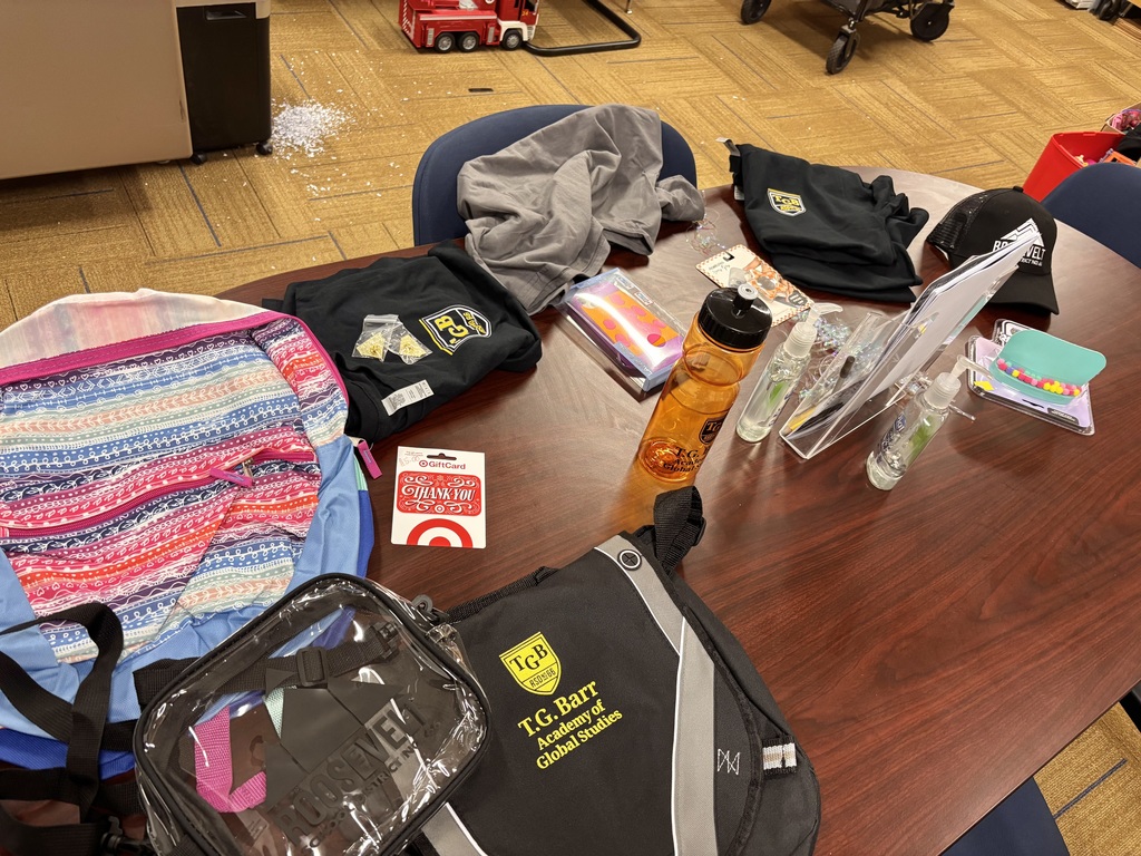 Table with items for winners rsd shirts, bottle, backpacks 