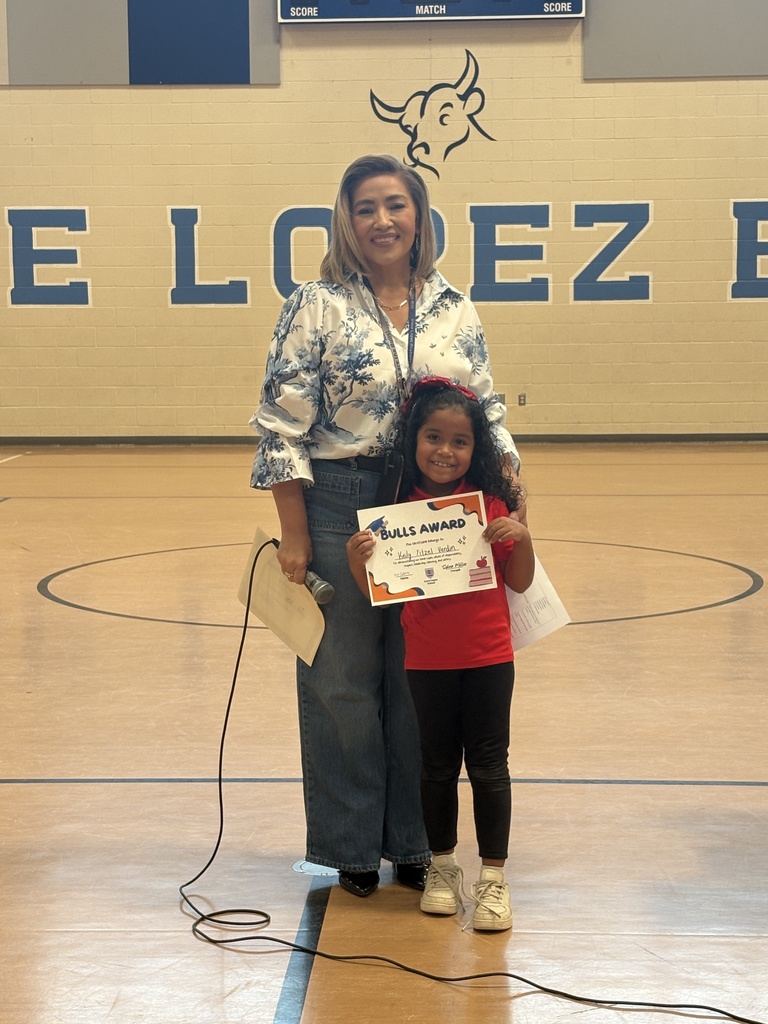 Mrs. Miller with 1st grade Bulls Winner