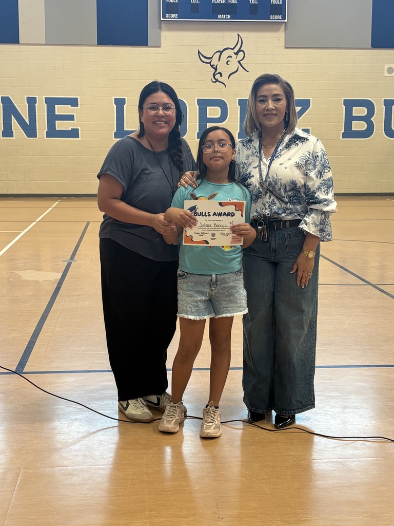 Mrs. Miller and Mrs. Williams with Bulls winner