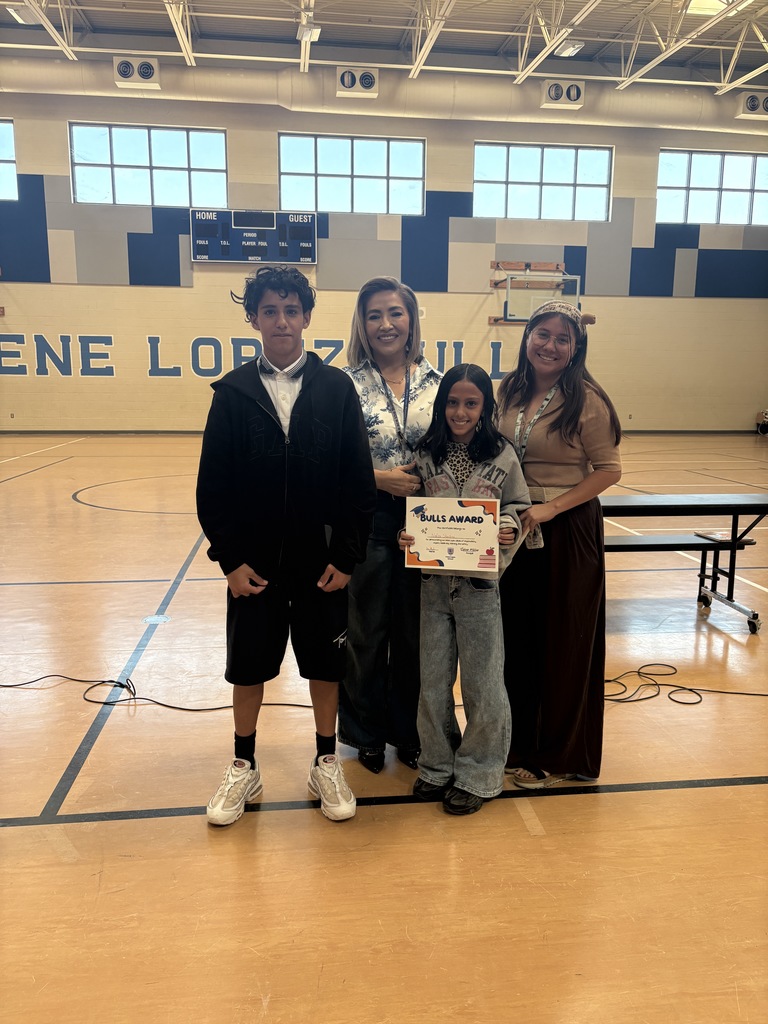 Mrs. Miller and Ms. Maldonado with Bulls winner and older brother