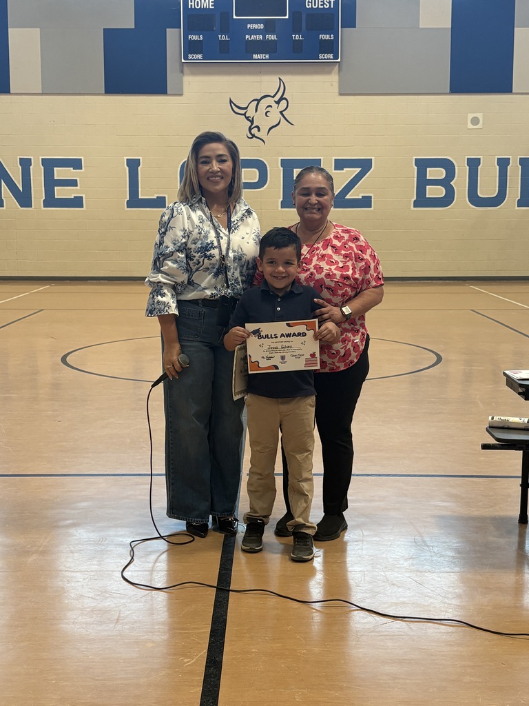 Mrs. Miller and Ms. Vizcarra with Bulls winner