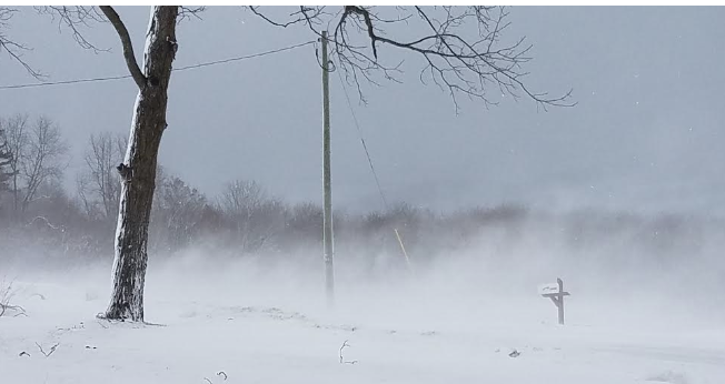 Windy, snow blowing