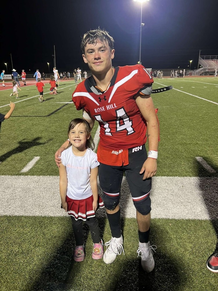 Sebastian poses with a young fan.