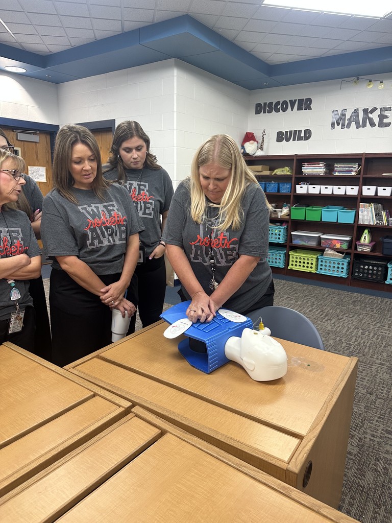 Teachers doing CPR and AED