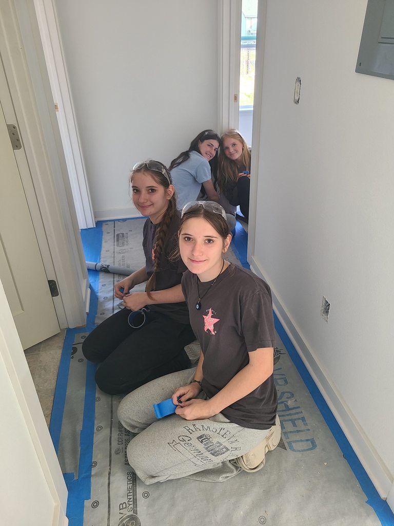 KAY Club students working with Habitat for Humanity - hallway work