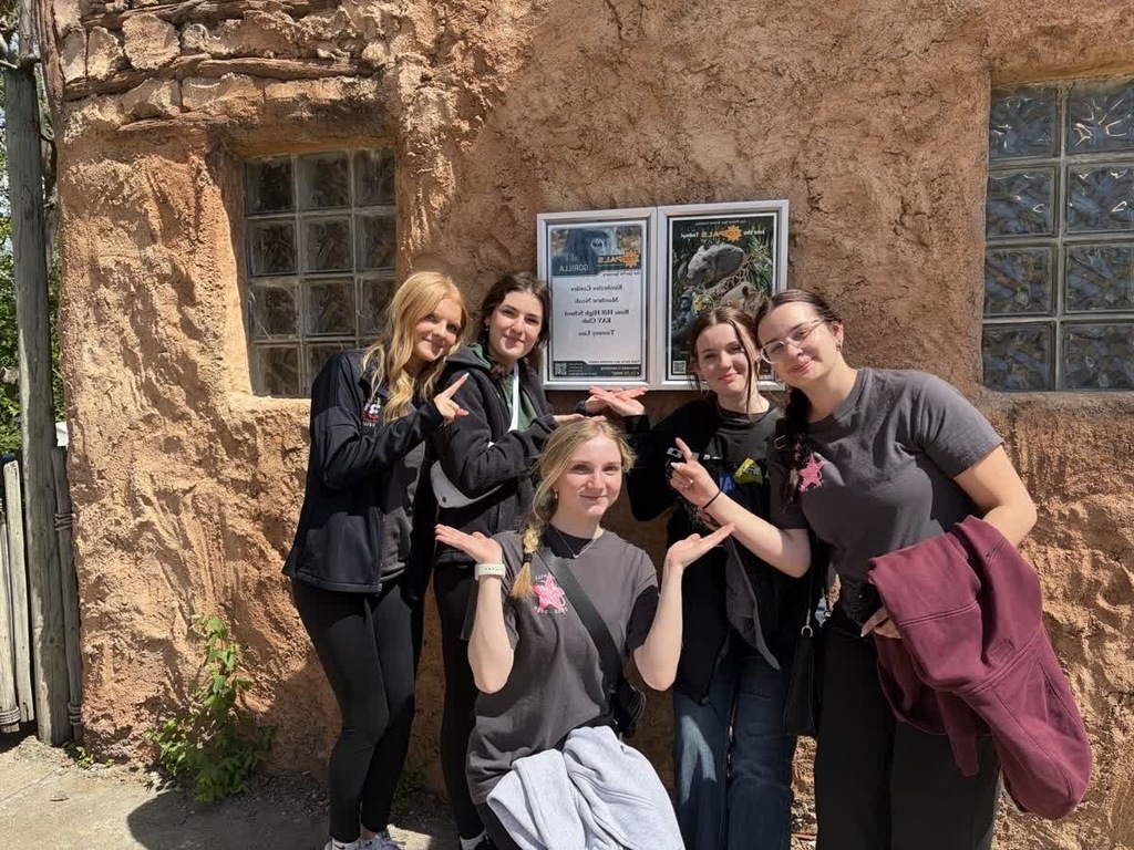 KAY Club members with their adopted animal, the penguin, at the zoo