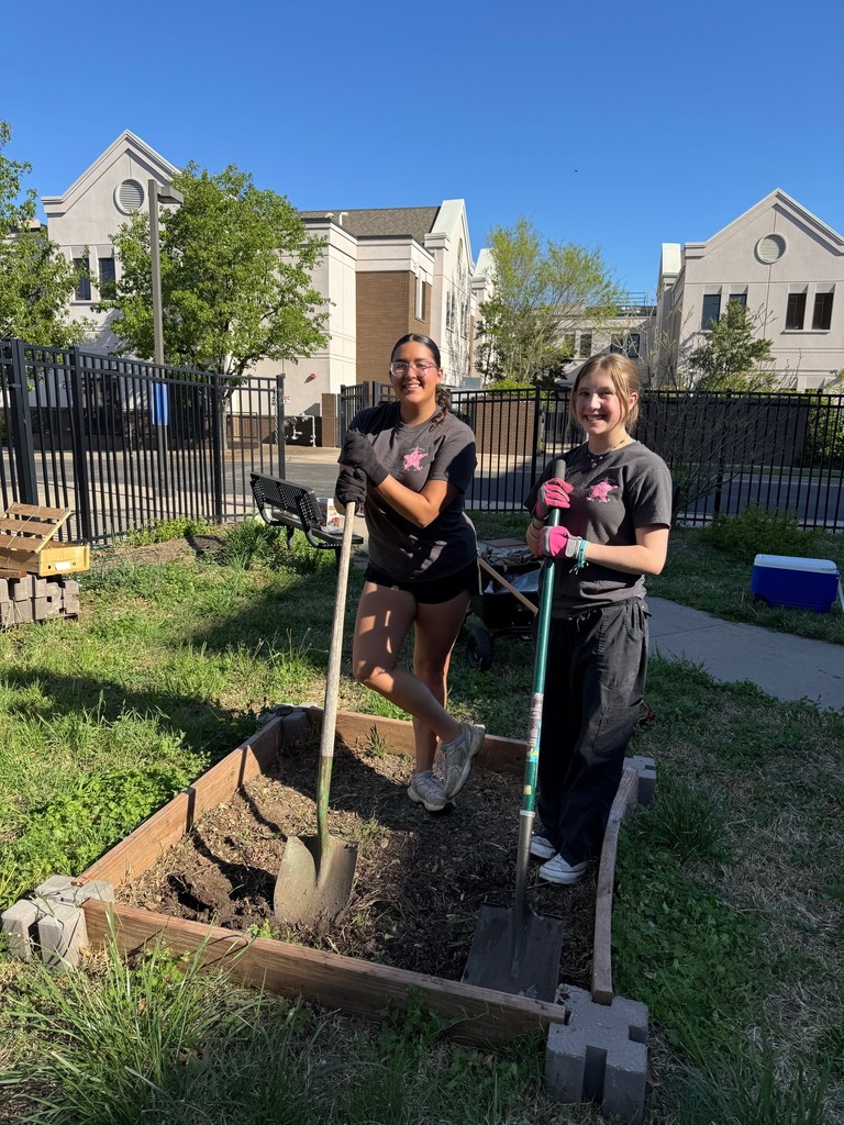 KAY Club members planting at the community garden in downtown Wichita