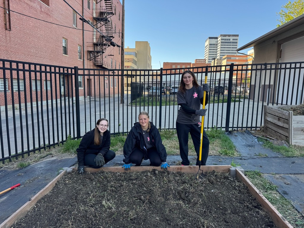 KAY Club members planting at the community garden in downtown Wichita