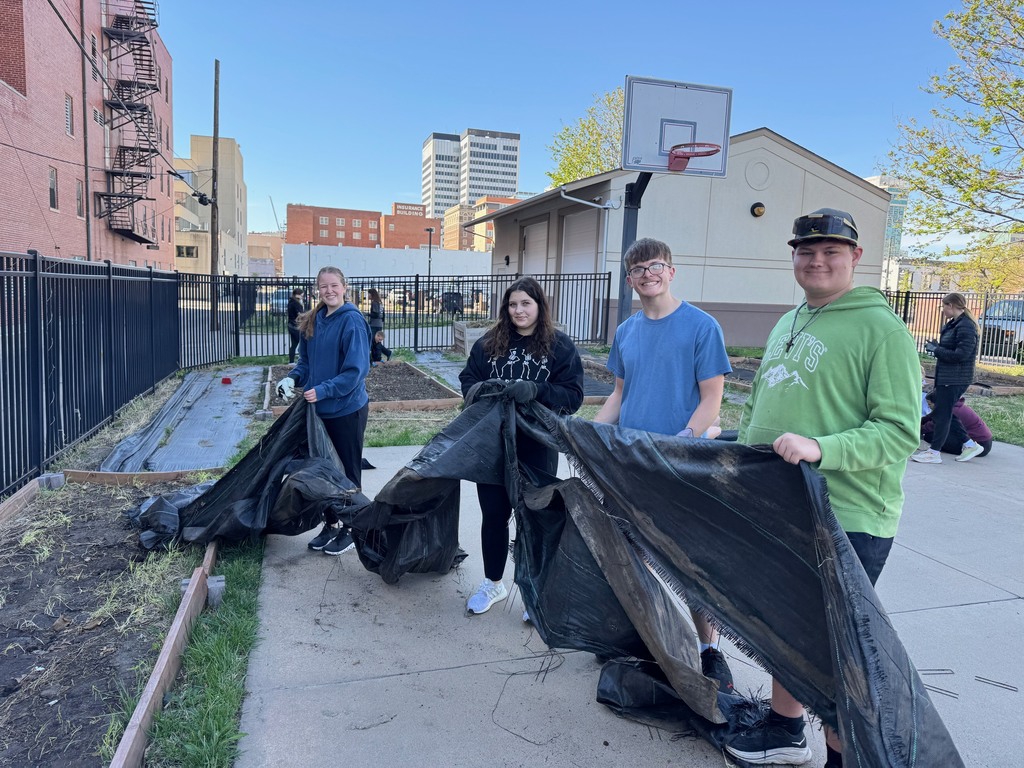 KAY Club members planting at the community garden in downtown Wichita
