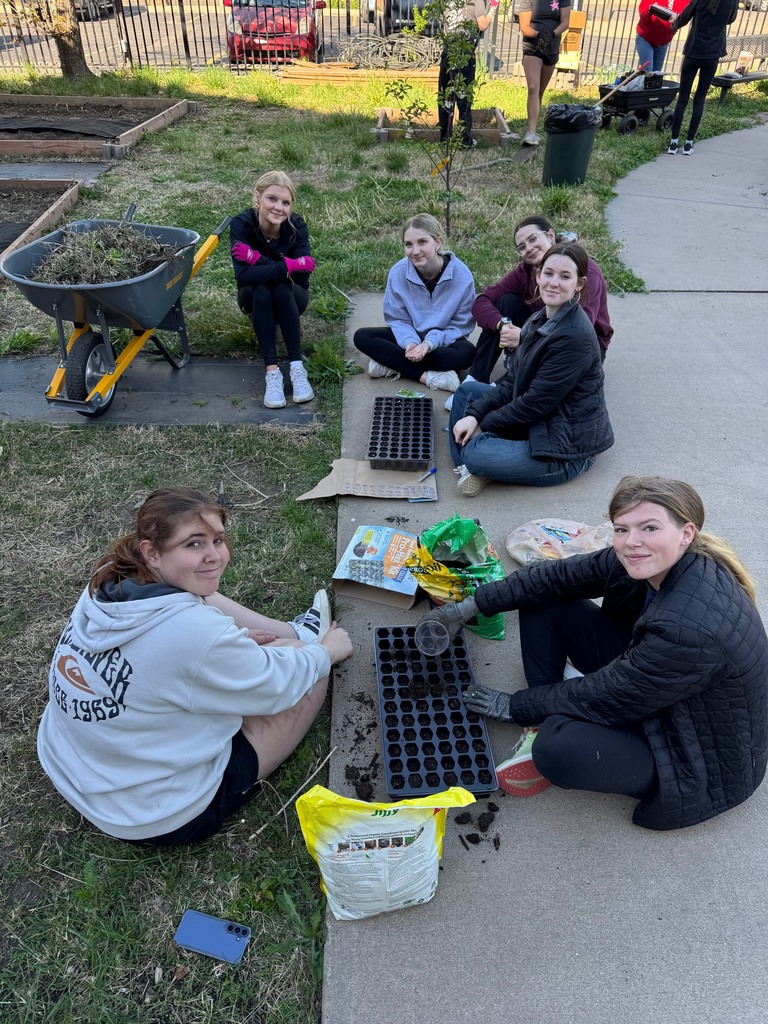 KAY Club members planting at the community garden in downtown Wichita