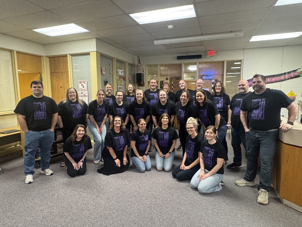 Purple Up shirts worn by Middle School teachers