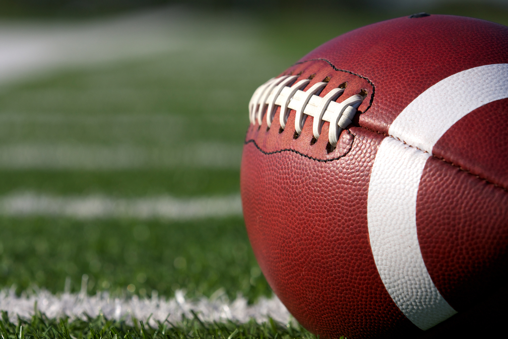 close up of a football on a field
