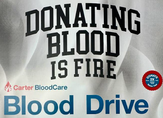 A white poster with black text reading "DONATING BLOOD IS FIRE" and a red logo. Below it, "Blood Drive" is in blue.