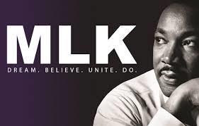 MLK Dream, Believe, Unite, Do on a black and purple background