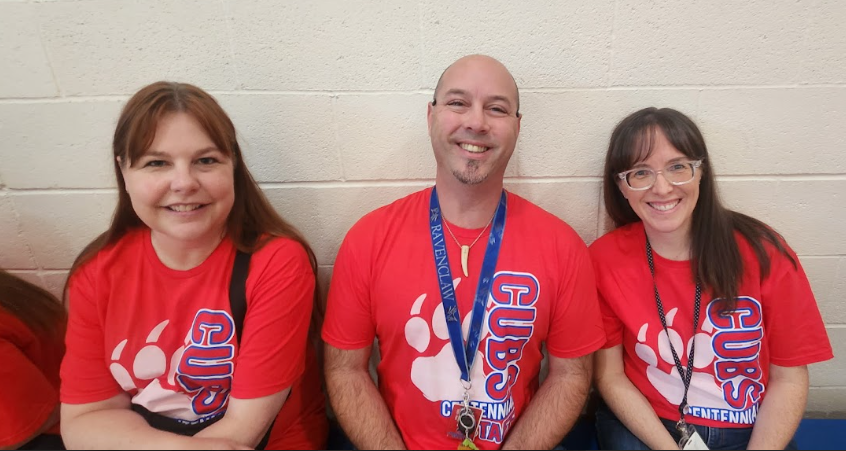 teachers in red shirts