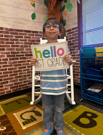 student with a sign