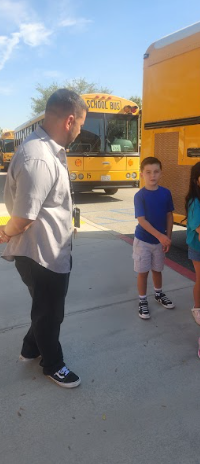 student and man by bus