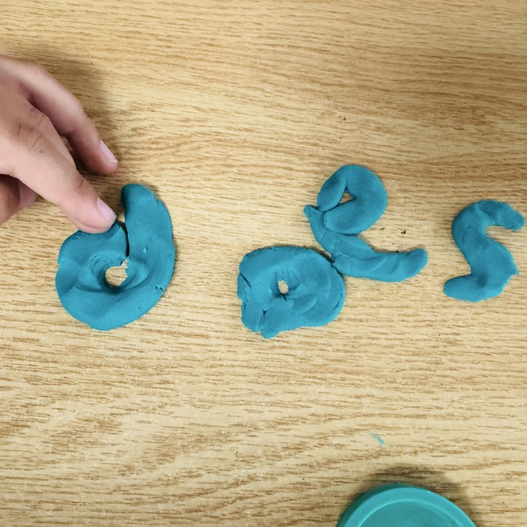 letters shaped out of playdoh 