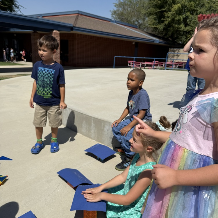 students listening to their teacher