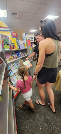 people checking out the book fair