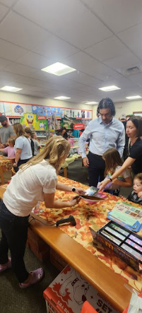 people checking out the book fair
