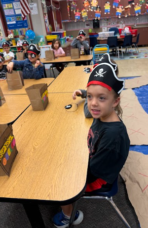 students with pirate hats