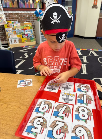 student  with pirate hats