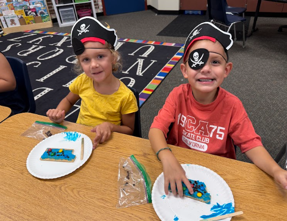 students with pirate hats