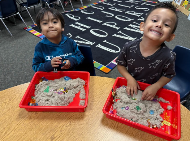 students with sand