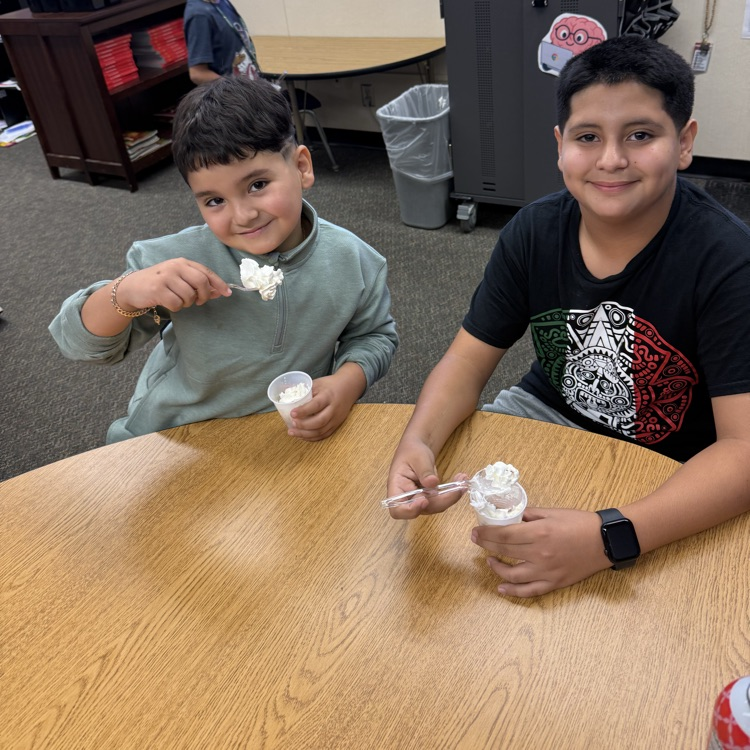 boys eating apple pie in a cup
