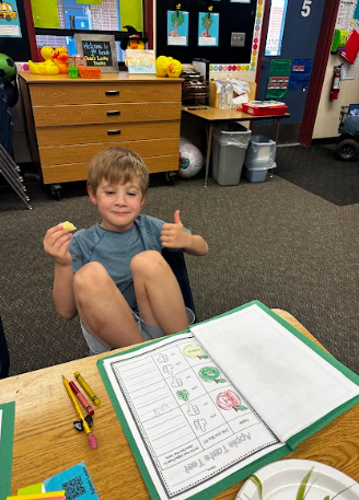 student tasting apple products