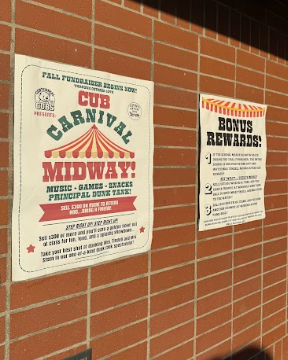 posters on a brick wall