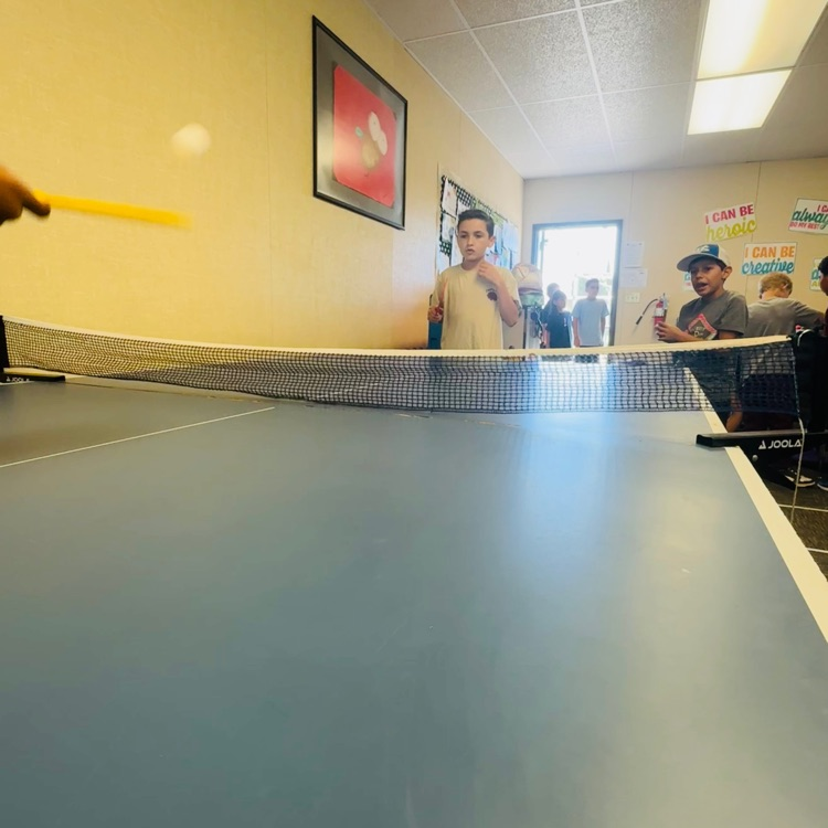 kids playing ping pong