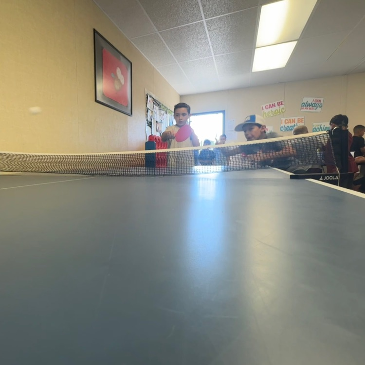 kids playing ping pong