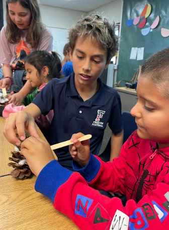 students with pinecone