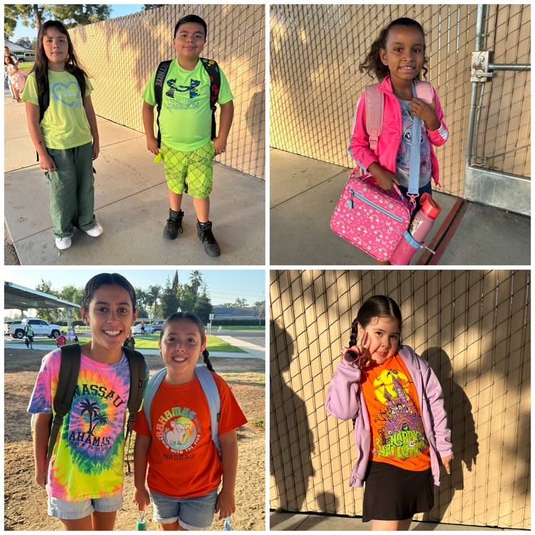 kids with back packs wearing neon colored shirts 