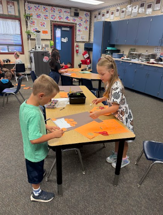 students working on a poster