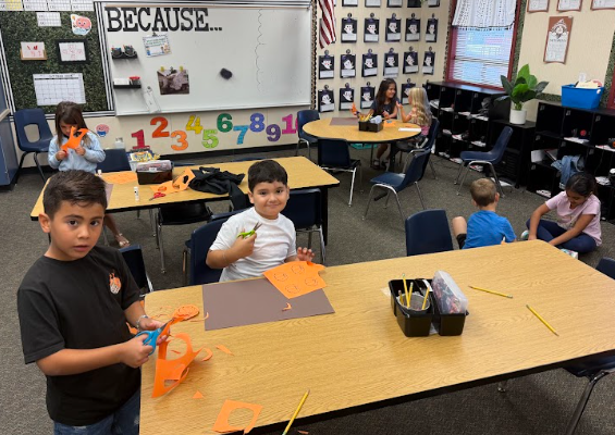 students working on a poster
