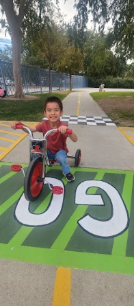 students playing on painted sidewalk