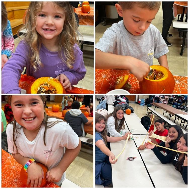 students with pumpkins making slime 