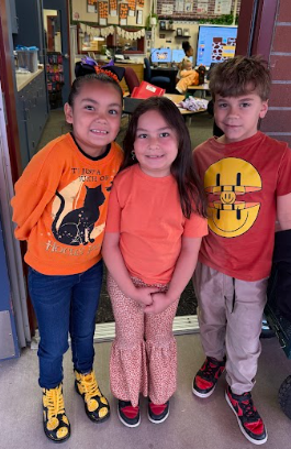 students wearing orange