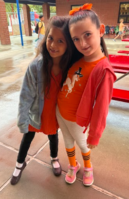 students wearing orange