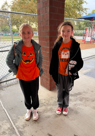 students wearing orange