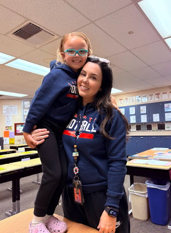 students and teacher dressed alike